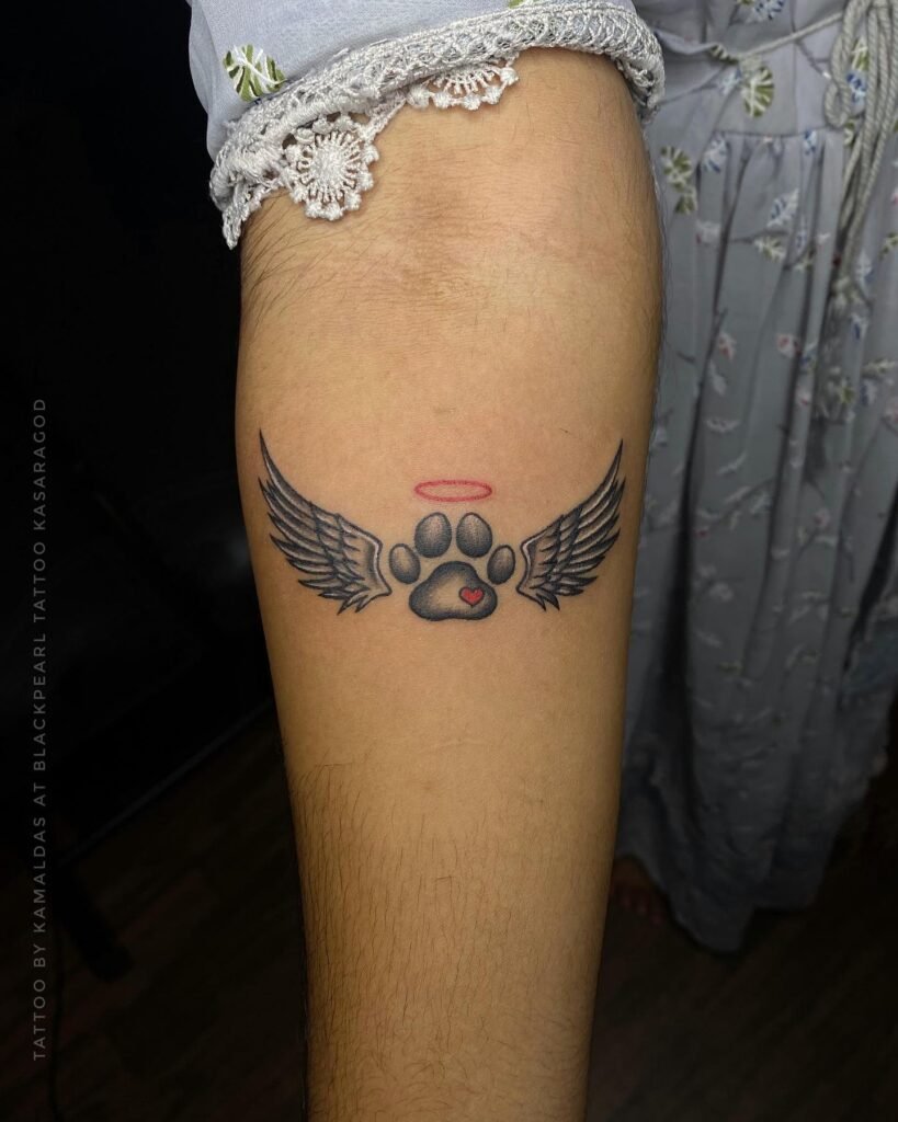 Dog Paw with Angel Wings and Halo Tattoo Design on Forearms
