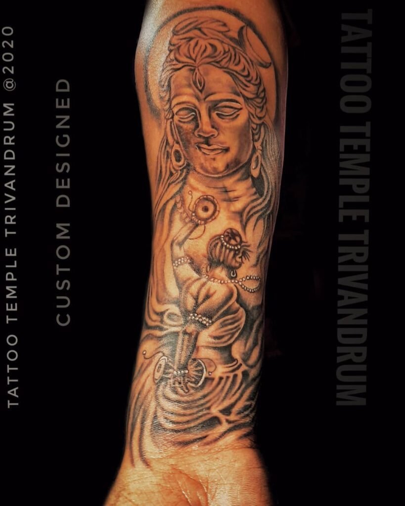 Shiva Parvati Tattoo Design, in which Parvati Devi is Dancing in front of Meditating Lord Shiva
