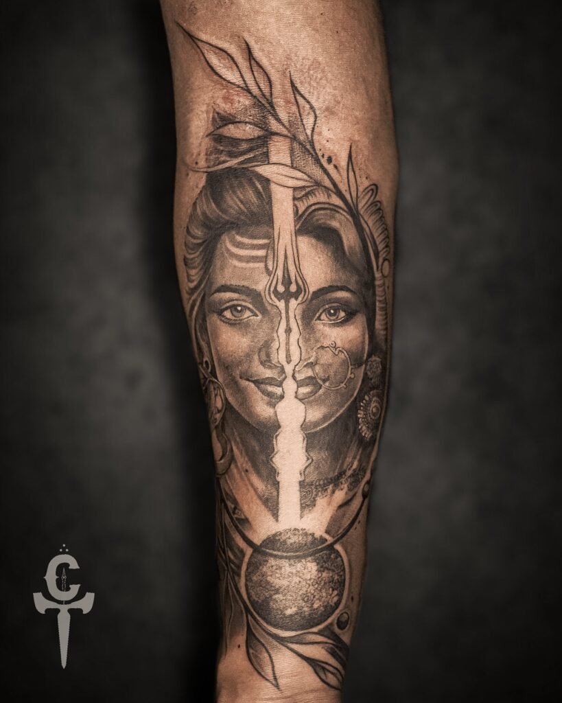 Half Shiva Half Parvati Tattoo Design with Smiling Face Ardhanari Tattoo Design on Hand -Black and White Realistic Tattoo on Hand
