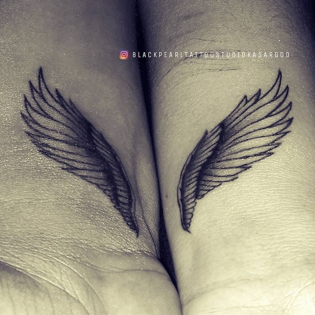 Wings Couple blackpearl tattoo kasaragod