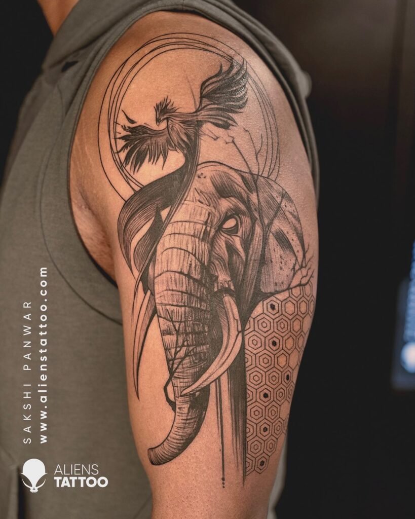 Elephant Tattoo Ideas for Males and Females 7 Upper Arms Biceps Tattoo Design of Elephant with Phoenix Combination