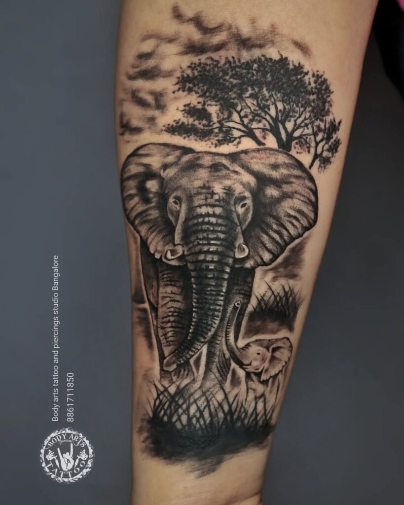 Elephant Tattoo Ideas for Males and Females 8 Realistic High Detailed Tattoo of Mother Elephant and Baby in the Forest