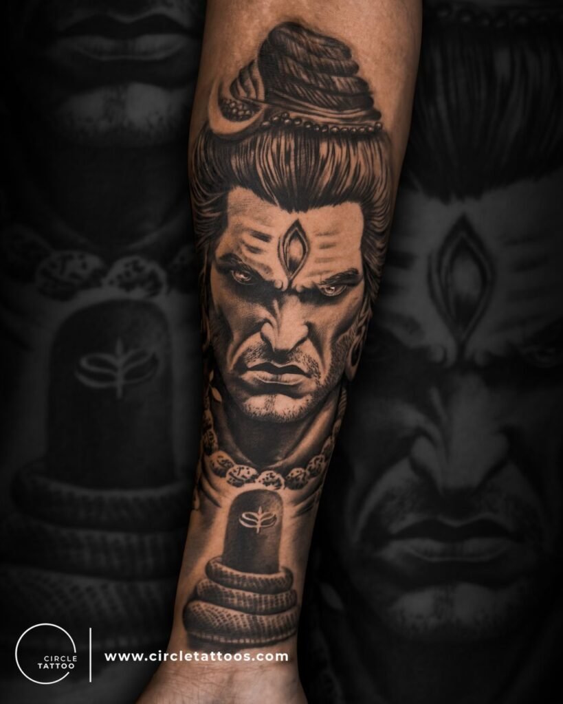 Angry Shiva Realistic Face with Shiva Lingam Combination Tattoo on Hand
