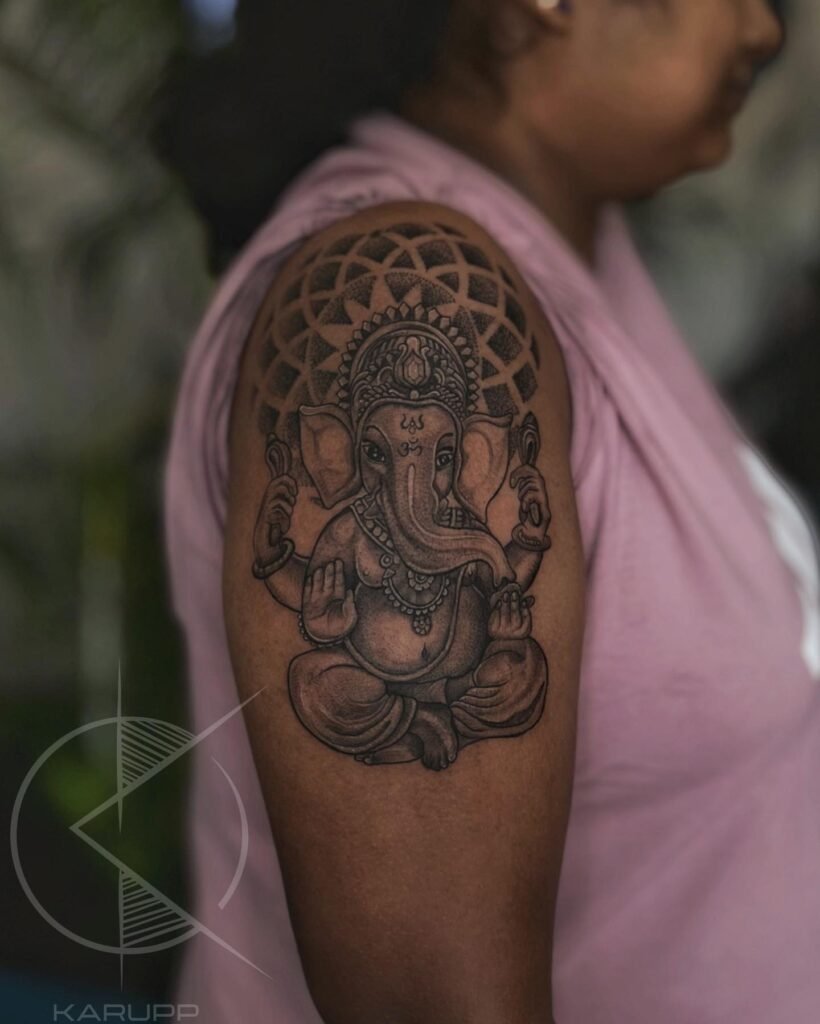 Ganesh Tattoo with Mandala Design Combination on Upper Arms