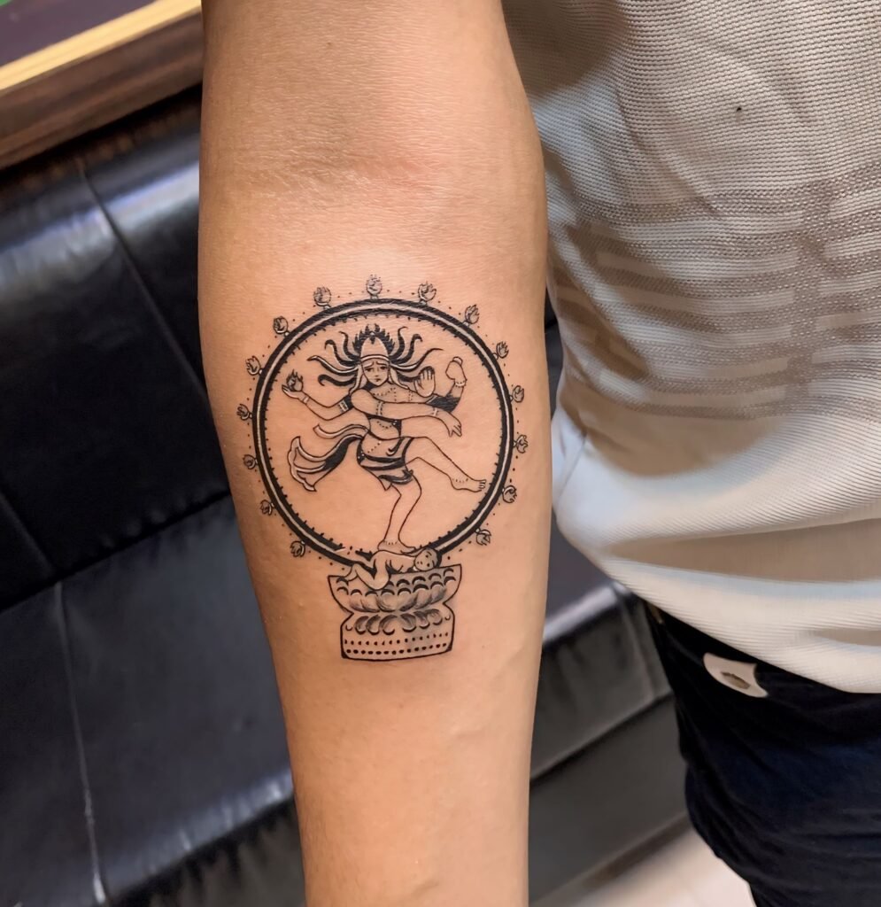 Simple Natraj Idol Tattoo on Forearms
