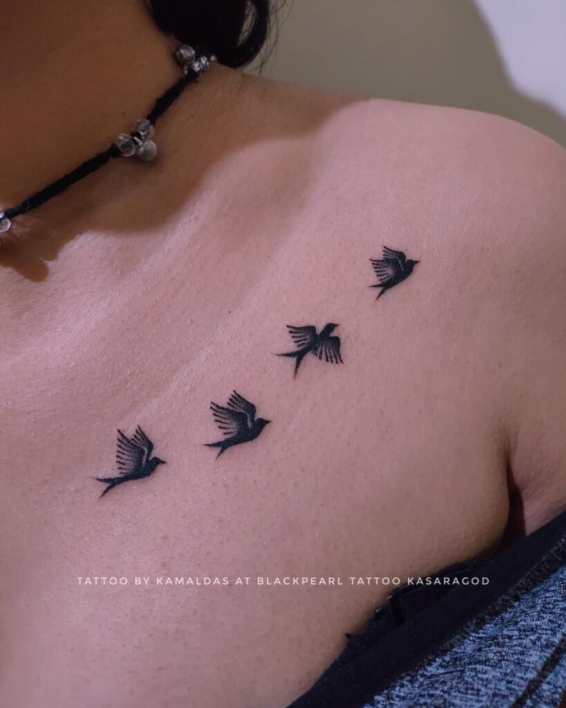 Simple Flying birds Low Neck Tattoo Design