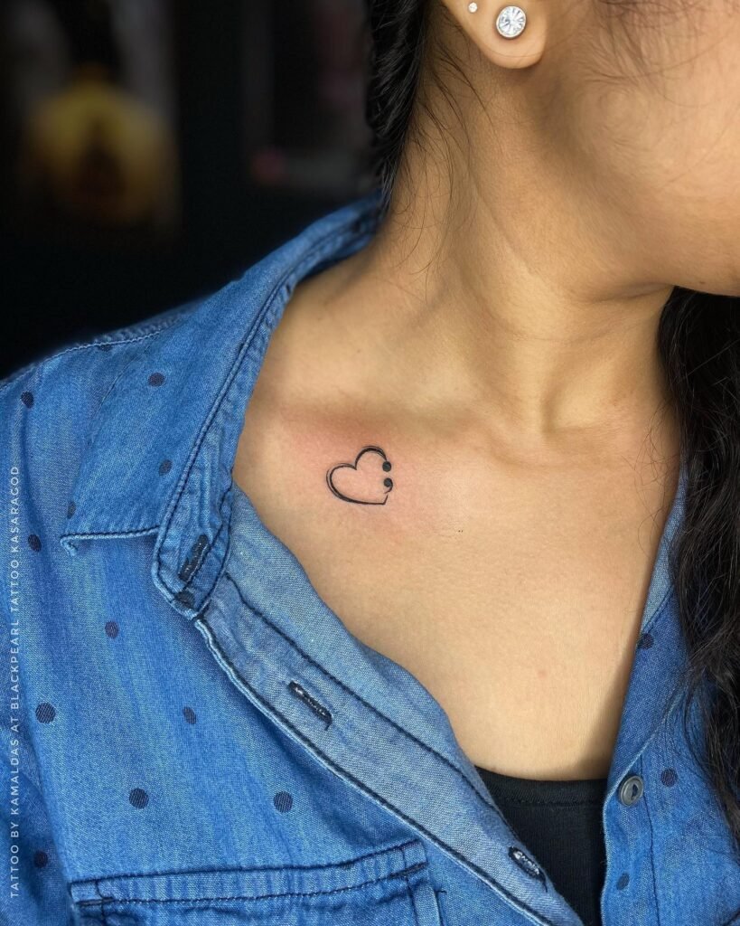 Simple and Small Heart Tattoo Design no Neck Bone